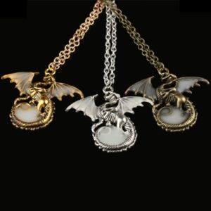 Glow in the dark dragon pendants in gold, silver and bronze